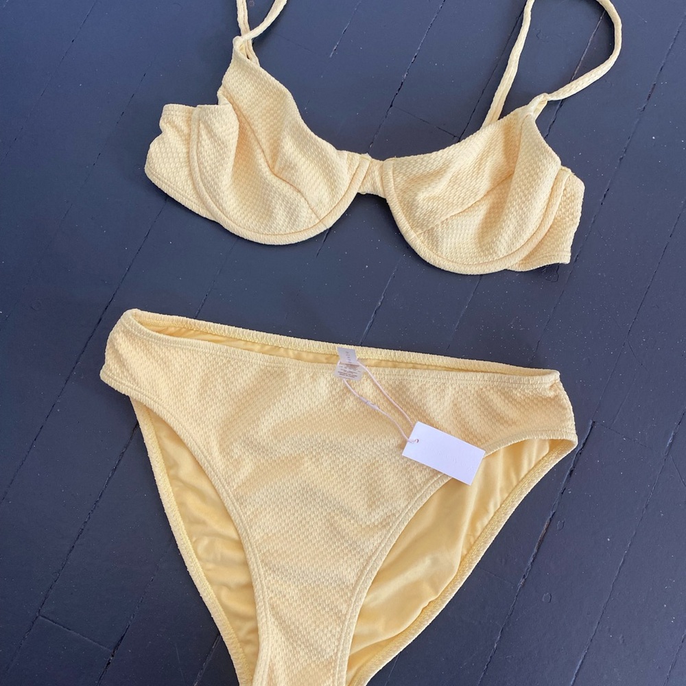 Yellow bikini. supportive top, and high cut full coverage bottoms. Size medium